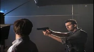 Apocalypse Game Plan featurette - Oded with gun.png (2.04 MB)