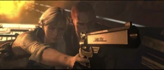 Jake & Sherry holding a gun together to finish off Ustanak