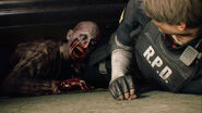 A zombie attacking Leon