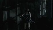 Jill Valentine wielding the infinite Rocket Launcher in her "Casual" costume while in the Birdcage corridor.