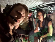 Chad Rook (Richard) aboard the S.T.A.R.S helicopter with Hannah John-Kamen (Jill)