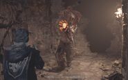 The Executioner prepares to slam his weapon down
