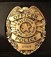 A look at the standard officer RPD badge (such as the one Leon is wearing on his coat.