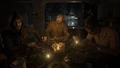 Jack Baker, au centre, durant la fameuse scène du repas.