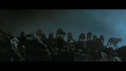 The pack of Cerberuses halt on the cliffside in Resident Evil: The Final Chapter