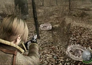 Leon about to shoot the trap to disarm it.