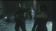 Robert prevents Ada from shooting Emma.