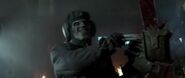 A Las Plagas Zombie use the chainsaw in Resident Evil: Retribution.