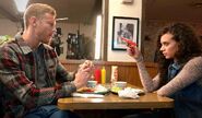 Tom Hopper (Wesker) and Hannah John-Kamen (Jill) filming their Emmy's Diner scene.