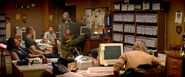 Aiken at his desk in the R.P.D, with his teammates: Jill, Wesker, Chris and Brad.