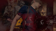 Leon killed by the Chainsaw Villager in Resident Evil 4 remake.