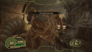 Chris punching Mama Mold after using the Anti-Regen Ammo