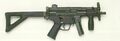 Heckler & Koch MP5K, with 15 round short magazine.