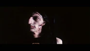 Apocalypse Zombie Choreography featurette - Undead make-up test 1.png (1 MB) An extra undergoing make-up tests, which includes a bite wound.