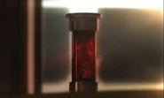 Un frasco con el virus