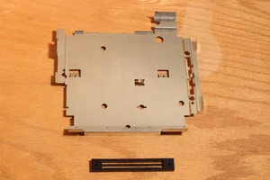 The lower heat shield and cartridge support