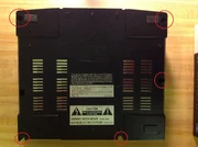 Remove the screws circled in red.