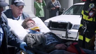 Declan leaves the building in the ambulance, dying after in the hospital