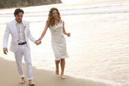 Jack and Amanda Walk by the Beach