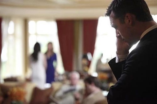 Aiden Makes a Call While Watching From Afar