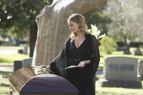 Emily Places a Flower on Amanda's Grave