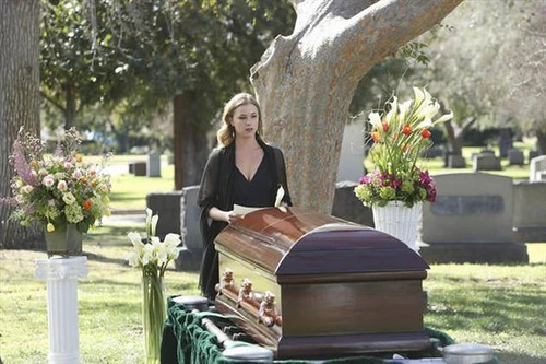 Emily Looks Serious at Amanda's Grave