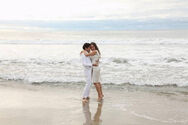 Jack and Amanda Embrace by the Beach