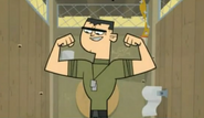 Brick showing off his muscles in the confessional.