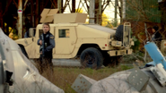 Militia around of the Humvees.