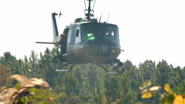 A Militia Huey hovering