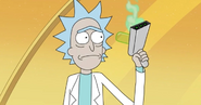 Rick Holding his Portal Gun With No Charge