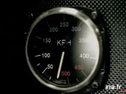 What appears to be the car's speedometer in a French commercial for the game