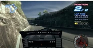 The rock formation however is not present in any other version (Ridge Racer 6 shown)