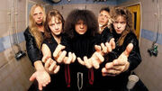 The classic Candlemass lineup holding up a gigantic invisible cat.