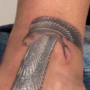Rihanna S Tattoos Rihanna Wiki Fandom Later, she got it covered with the tattoo of an 'egyptian falcon' in 2012. rihanna s tattoos rihanna wiki fandom