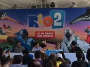 Carlos Saldanha next to the Carlinhos Brown, Rodrigo Santoro, and Sérgio Mendes in Conference of Rio 2 in Brazil