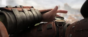 Compass strapped to his gauntlet