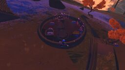 Scorched Acres Found on the island higher up, formed with objects on the ground (one circular mask is off to the side)