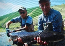 Jeremy and his guide hold the rare Taimen Salmon.