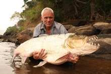 Jeremy holding his famous Goliath Tigerfish catch.