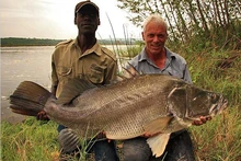 Jeremy and his guide holding a large Nile Perch caught in Africa.