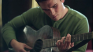 Season 1 Episode 5 Heart of Darkness Archie playing guitar