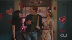 Betty and Veronica approach Archie about a special date
