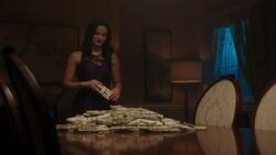 Veronica with Nick's ransom money