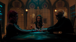 Toni, Cheryl, and Nana Rose perform a seance