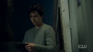 Season 1 Episode 13 The Sweet Hereafter Jughead holding Southside Serpent jacket 2.png (1.02 MB)