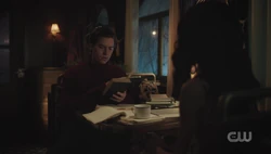 Tabitha gifts Jughead a book