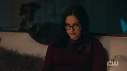 Veronica watching her parents meeting with the Mayor