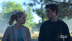 Betty telling Arche about her talks with the Black Hood as they walk to school