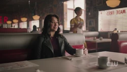 Agent Drake tells Betty about pyrokinesis